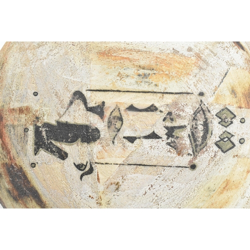 174 - A selection of 20th century studio art pottery charger plates. Each charger being hand-painted and m... 