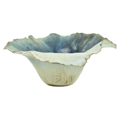 177 - A studio art pottery glazed ceramic vase. The vase having a flared napkin-style rim with blue tones ... 