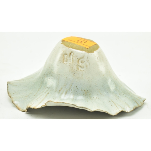 177 - A studio art pottery glazed ceramic vase. The vase having a flared napkin-style rim with blue tones ... 