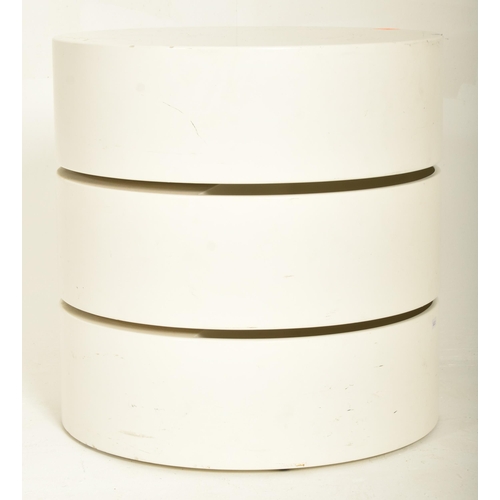 178 - An Italian style retro mid 20th century white moulded plastic rotating storage side coffee table. Th... 