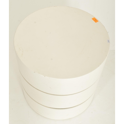 178 - An Italian style retro mid 20th century white moulded plastic rotating storage side coffee table. Th... 