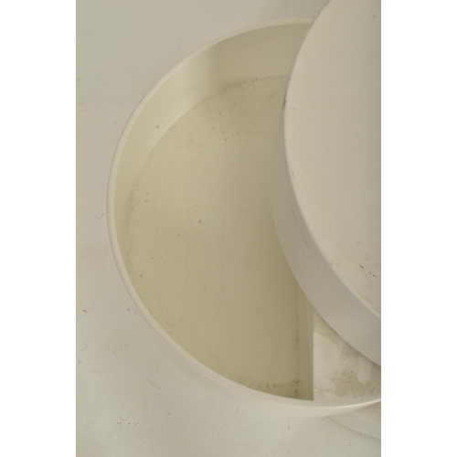 178 - An Italian style retro mid 20th century white moulded plastic rotating storage side coffee table. Th... 