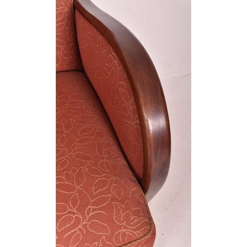 18 - A matching pair of vintage 20th century 1930s Art Deco club armchairs. Each chair having overstuffed... 