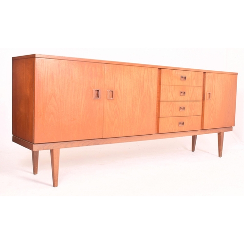 25 - Danish Modern Design - a retro mid 20th century teak wood sideboard credenza. The sideboard having a... 