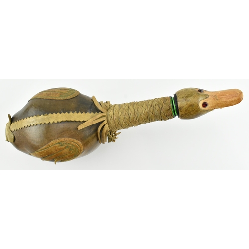 36 - An Italian Empoli style 20th century leather and glass duck decanter bottle. The bottle having a duc... 