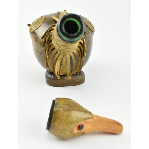 36 - An Italian Empoli style 20th century leather and glass duck decanter bottle. The bottle having a duc... 