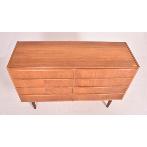 39 - Danish Modern Design - a retro mid 20th century circa 1960s teak wood chest of drawers. The chest ha... 