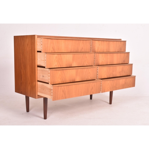 39 - Danish Modern Design - a retro mid 20th century circa 1960s teak wood chest of drawers. The chest ha... 