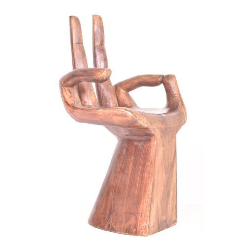 6 - A vintage 20th century carved decorative hardwood occasional side chair / seat in the shape of hand.... 