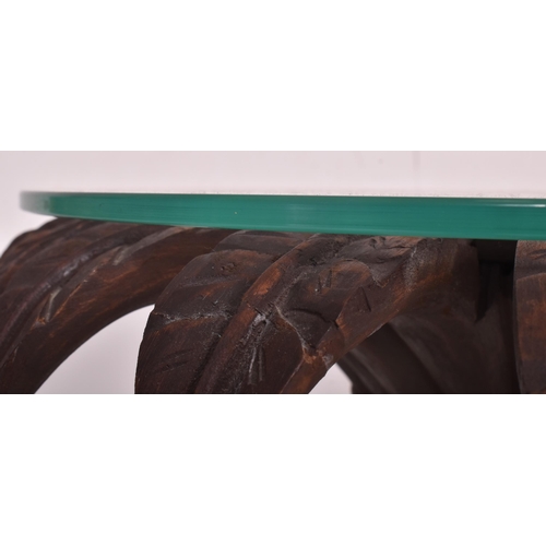 7 - A vintage 20th century Continental Hollywood Regency carved wood 'Sunflower' table / lamp table. The... 