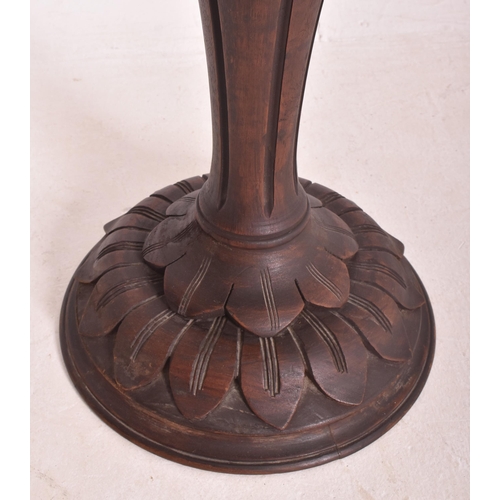 7 - A vintage 20th century Continental Hollywood Regency carved wood 'Sunflower' table / lamp table. The... 