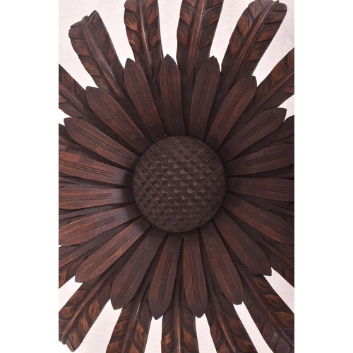 7 - A vintage 20th century Continental Hollywood Regency carved wood 'Sunflower' table / lamp table. The... 