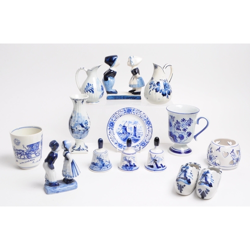 362 - Collection of 20th century Dutch Delft ware pottery pieces. Including boy and girl statues, jugs, be... 