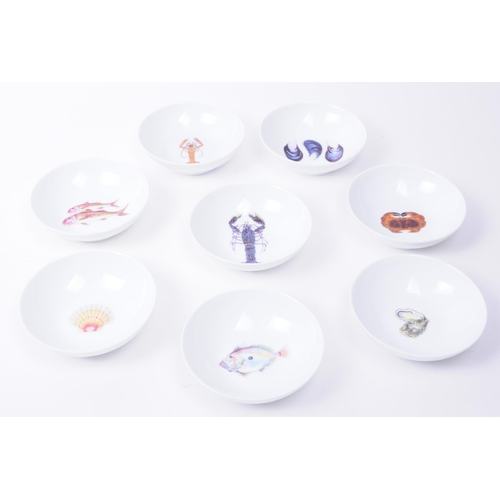 368 - De Limoges - Eight French Richard Bramble porcelain small seafood dishes each decorated with a diffe... 