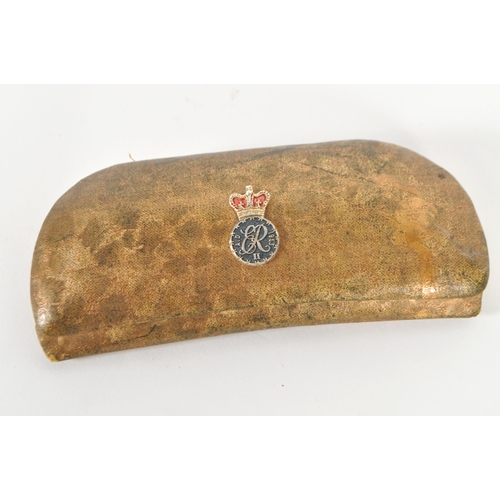 209 - Goldray - A mid 20th century pair of cat eye reading glasses. Having a gilt frame and arms, frameles... 