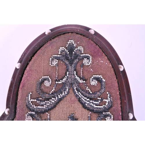 211 - Victorian 19th century mahogany framed beadwork wall hanging / table top piece with four ceramic bun... 