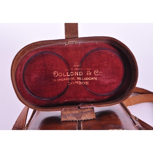 237 - Dollond - Early 20th century London made binoculars x5 2 7/16. Housed within the original leather ca... 