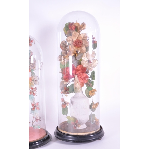 240 - Two late 19th century French globe de mariée wedding glass domes containing bisque porcelain vases w... 