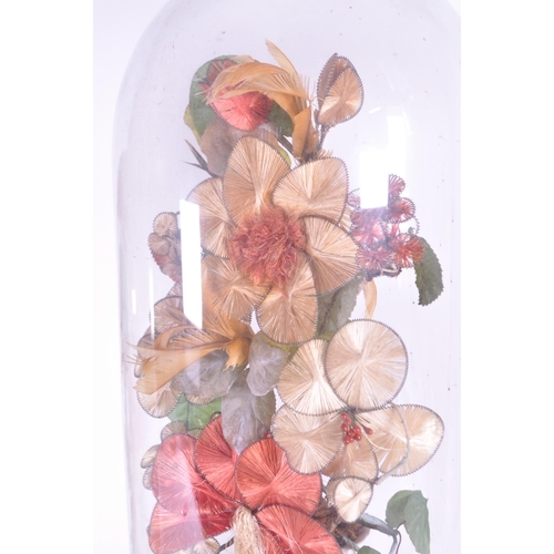 240 - Two late 19th century French globe de mariée wedding glass domes containing bisque porcelain vases w... 