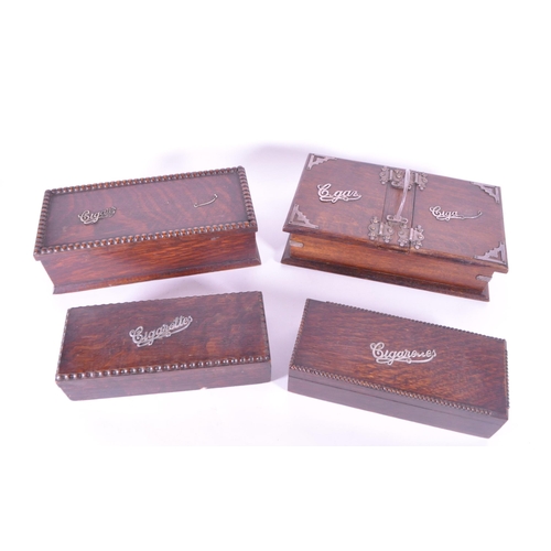 241 - Four Edwardian early 20th century art deco style wooden cigarette and cigar boxes. Cigarettes boxes ... 