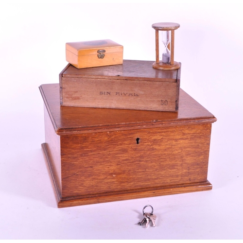 242 - A vintage 20th century Royals Carter cigar wooden box. Along with an oak lock box chamfered with hin... 