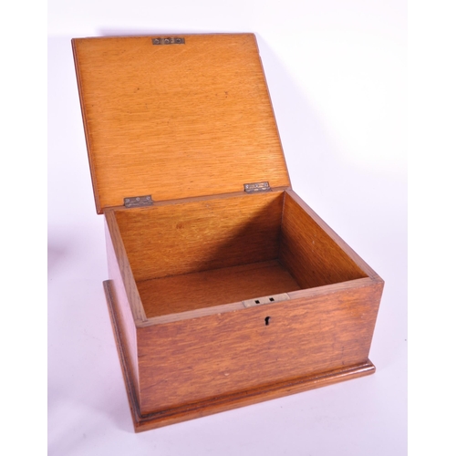 242 - A vintage 20th century Royals Carter cigar wooden box. Along with an oak lock box chamfered with hin... 