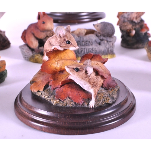 244 - A collection of resin animal figurines / statues. To include rabbits, birds, owls, mice, fox, hedgeh... 