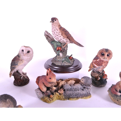 244 - A collection of resin animal figurines / statues. To include rabbits, birds, owls, mice, fox, hedgeh... 