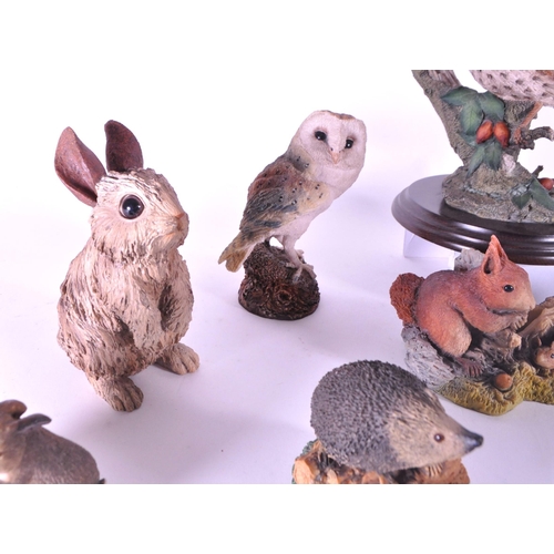 244 - A collection of resin animal figurines / statues. To include rabbits, birds, owls, mice, fox, hedgeh... 
