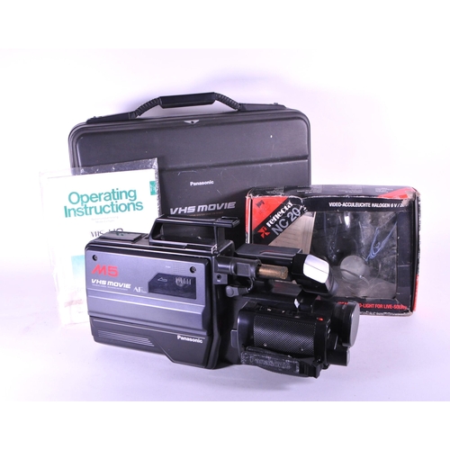 246 - Panasonic - 1980s VHS NV-M5 series hand held recorder and playback video movie camera. Housed within... 