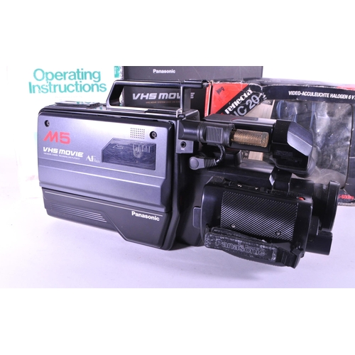 246 - Panasonic - 1980s VHS NV-M5 series hand held recorder and playback video movie camera. Housed within... 