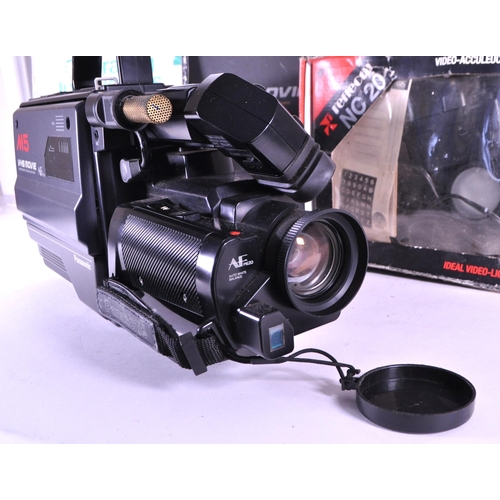 246 - Panasonic - 1980s VHS NV-M5 series hand held recorder and playback video movie camera. Housed within... 