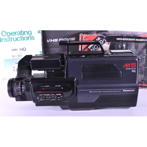 246 - Panasonic - 1980s VHS NV-M5 series hand held recorder and playback video movie camera. Housed within... 