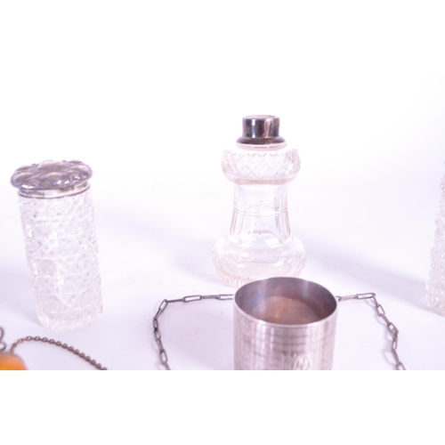 255 - Collection of early 20th century hallmarked silver pieces, comprised of a napkin ring, chain clutch ... 