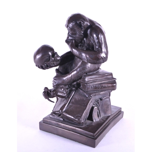 261 - WITHDRAWN After Wolfgang Hugo Rheinhold (1853-1900) - A 20th century cast resin bronzed 'Affe Mit Sc... 