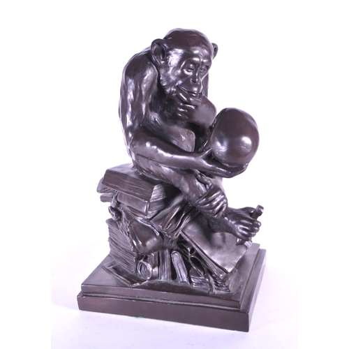 261 - WITHDRAWN After Wolfgang Hugo Rheinhold (1853-1900) - A 20th century cast resin bronzed 'Affe Mit Sc... 