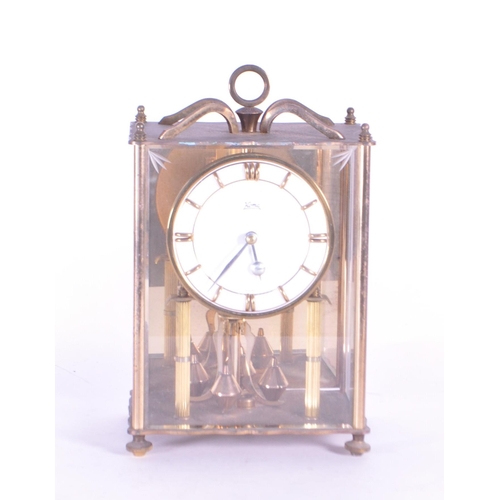 262 - Koma, Getrmany - A vintage 20th century 1970s Koma mantel carriage / anniversary clock. Having ring ... 