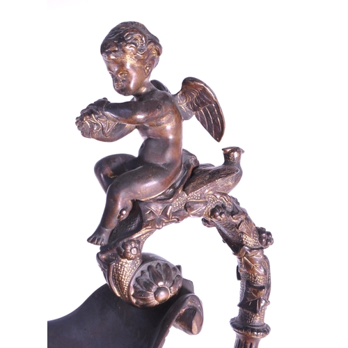 263 - A large 19th century French ormolu and bronze type ewer, the scroll handle surmounted by a cherub an... 