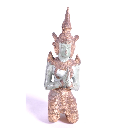 265 - Two 20th century bronze Thai Buddha temple figures. In traditional clothing with one playing drum th... 