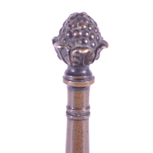 270 - A 19th century bronze letter magazine rack / desk tidy. Neoclassical design with acorn finial to cen... 