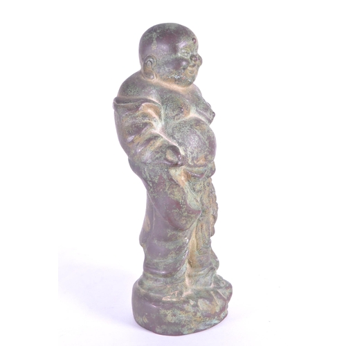 274 - A vintage 20th century metal standing Chinese laughing Buddha. Measures approx. 22cm tall - Patina t... 