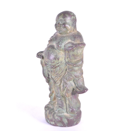 274 - A vintage 20th century metal standing Chinese laughing Buddha. Measures approx. 22cm tall - Patina t... 
