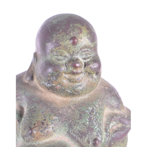 274 - A vintage 20th century metal standing Chinese laughing Buddha. Measures approx. 22cm tall - Patina t... 