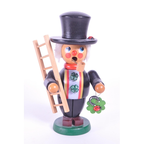 276 - Christian Ulbricht - Late 20th century German wooden incense burner figure in the form of an Irish s... 