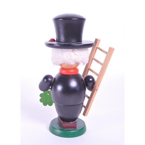 276 - Christian Ulbricht - Late 20th century German wooden incense burner figure in the form of an Irish s... 