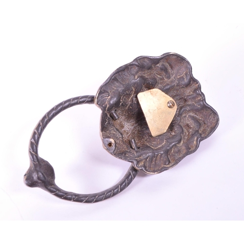 280 - A 19th century Victorian lion brass door knocker. Featuring a lion's head with ring knocker with ano... 