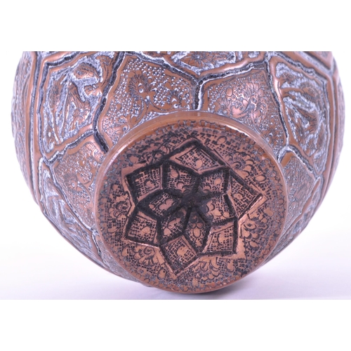 281 - North African early 20th century repousse copper vase. Flared rim into a bulbous body with bird figu... 