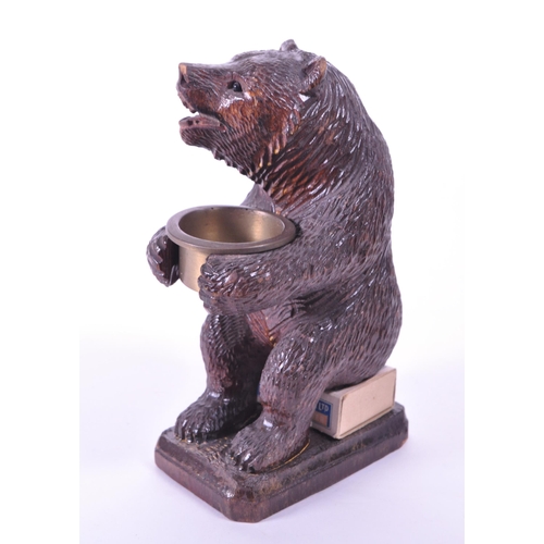 282 - 20th century German black forest wooden carved bear match strike figure with metal bowl match holder... 