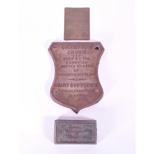 283 - Three late 19th / early 20th century metal plaques, comprised of a Champion Churn Dairy Supply Co Lt... 