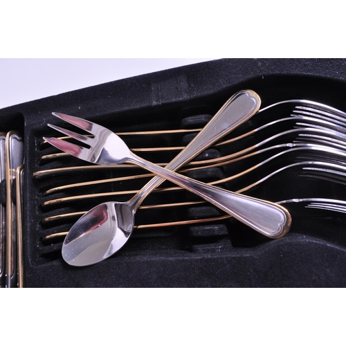 284 - Solingen - Edelstahl Rostfrei - Late 20th century German CRC 23 / 24K gold plated eight person setti... 